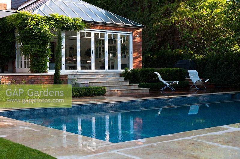 jardin privé Hampshire design designer aménagement paysager moderne contemporain Diplômé Paysages soleil ensoleillé vue pierre banlieue patio