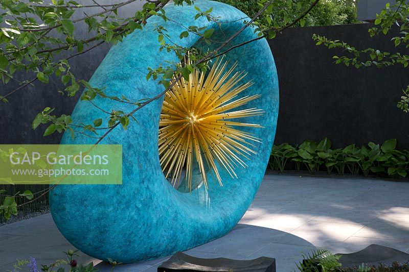 Verdigris Aeon sculpture, The David Harber and Savills garden, Sponsor: David Harber and Savills. RHS Chelsea Flower Show, 2018.