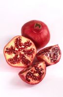 Punica granatum - Fruits de grenade en tranches et entiers