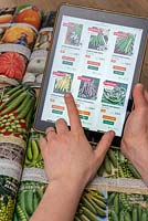 Commande de graines de légumes sur une tablette numérique